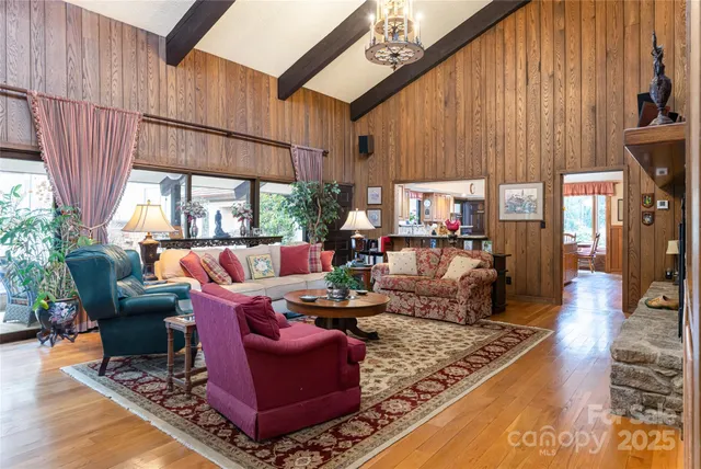 a spacious bathroom with a granite countertop sink mirror and toilet
