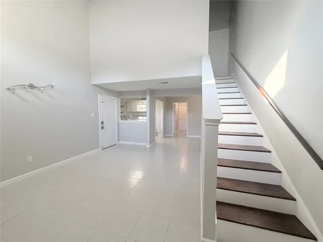 a view of a hallway with staircase
