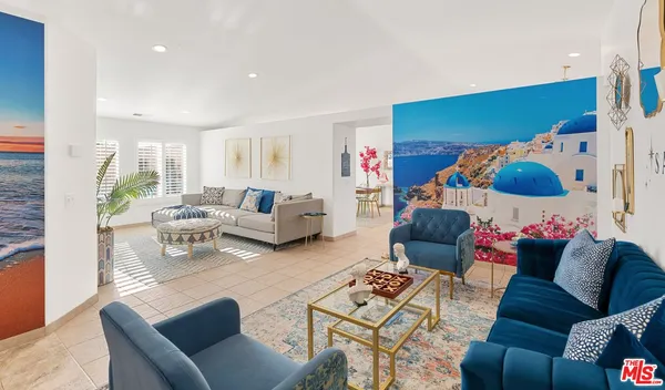 a living room with furniture and a couch