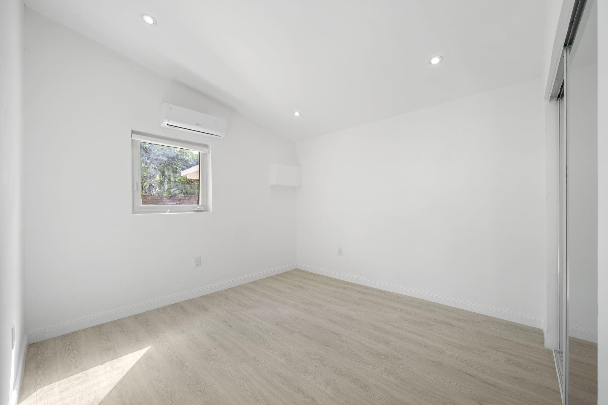 823 Southwest 27th Street Fort Lauderdale, FL 33315 - Photo 21 of 56 an empty room with a window
