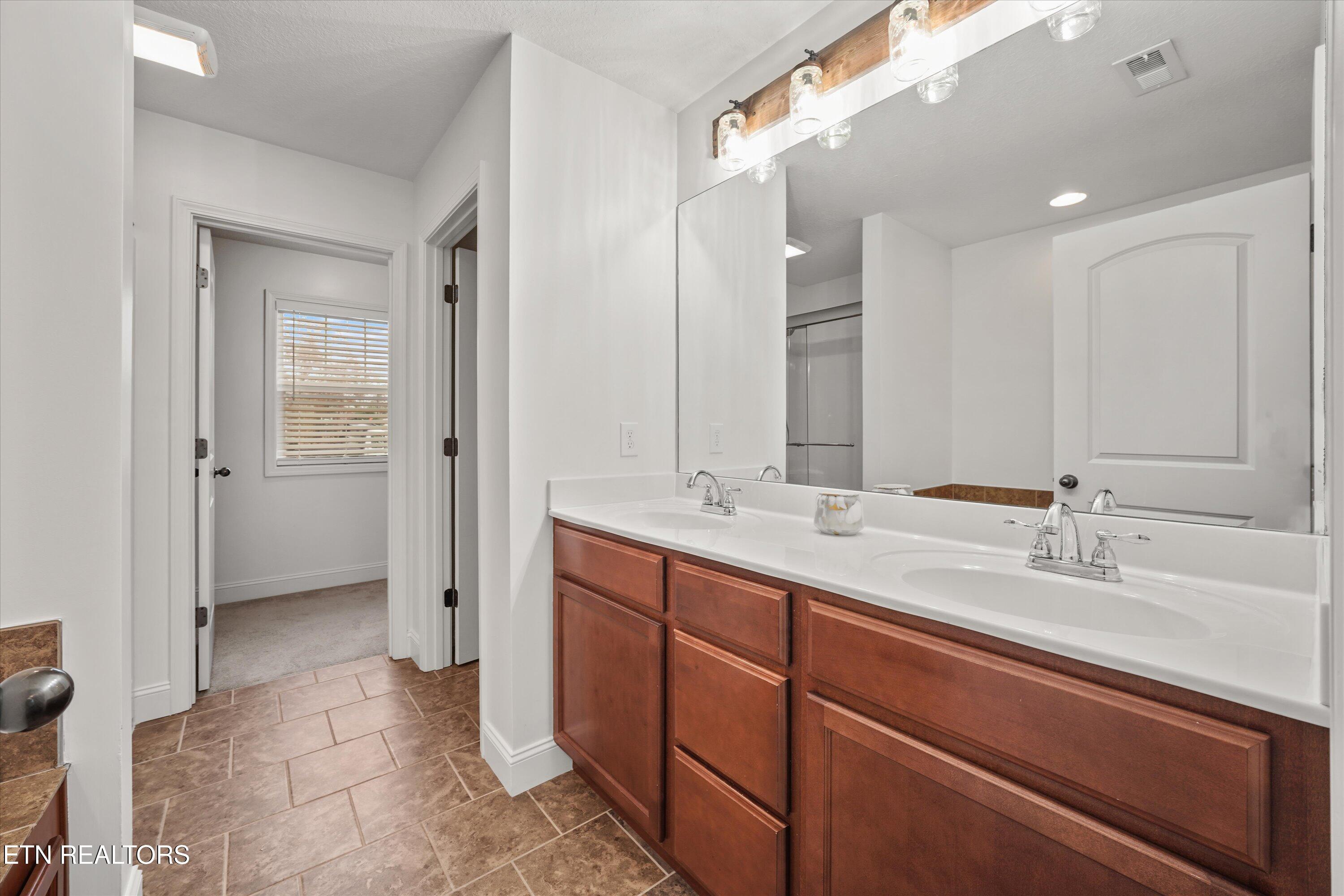 165 Crossroads Boulevard Oak Ridge, TN 37830 - Photo 21 of 39 Primary Bath with Double Vanities