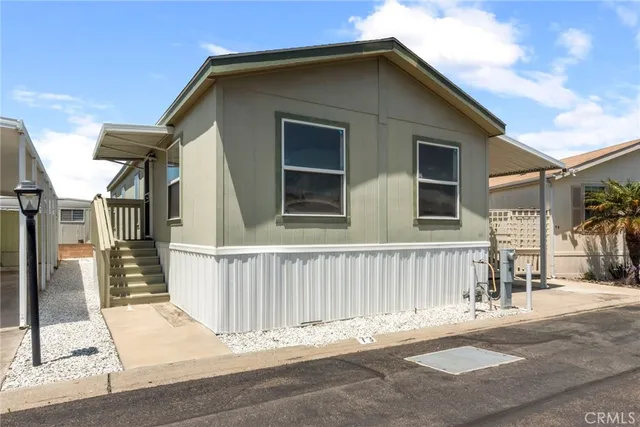 a view of a house with a street