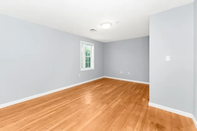 an empty room with window