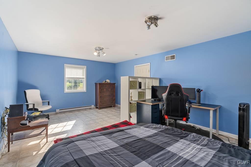 114 Peggy Lane Nazareth, PA 18064 - Photo 46 of 50 a bedroom with a bed and furniture
