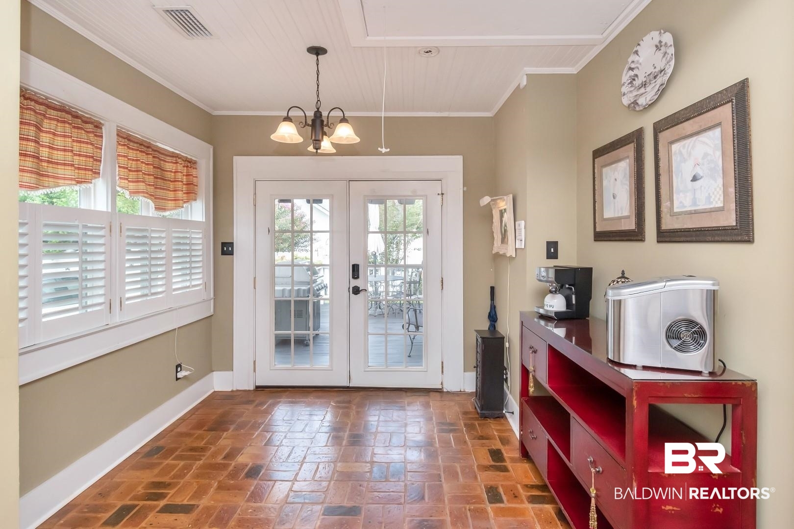 117 South Fulton Street Mobile, AL 36606 - Photo 3 of 34 Doorway with an inviting chandelier, crown molding, and french doors