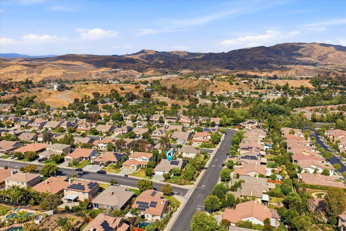 23732 Bella Vista Road Corona, CA 92883 - Photo 42 of 49 an aerial view of residential houses with outdoor space