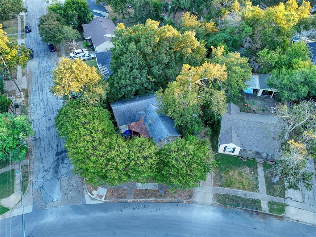 3412 Brook Circle Waco, TX 76710 - Photo 2 of 16 an aerial view of a house with a yard and garden