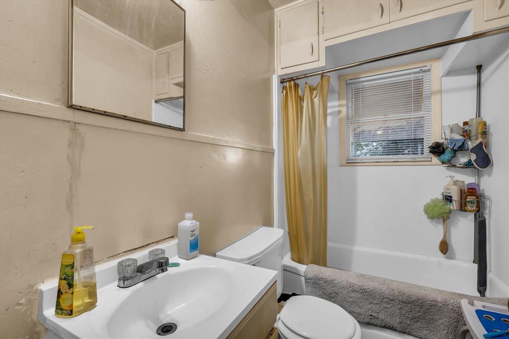 3412 Brook Circle Waco, TX 76710 - Photo 8 of 16 a bathroom with a sink and toilet