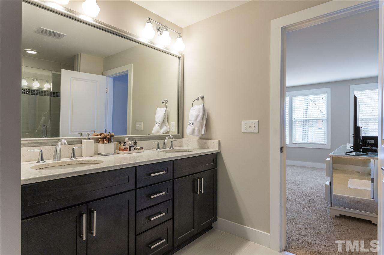 531 North Person Street, Unit 103 Raleigh, NC 27604 - Photo 15 of 21 The double vanity allows for plenty of room to get ready and stow your personal effects. You won't find this much space, comfort, and practicality anywhere downtown.