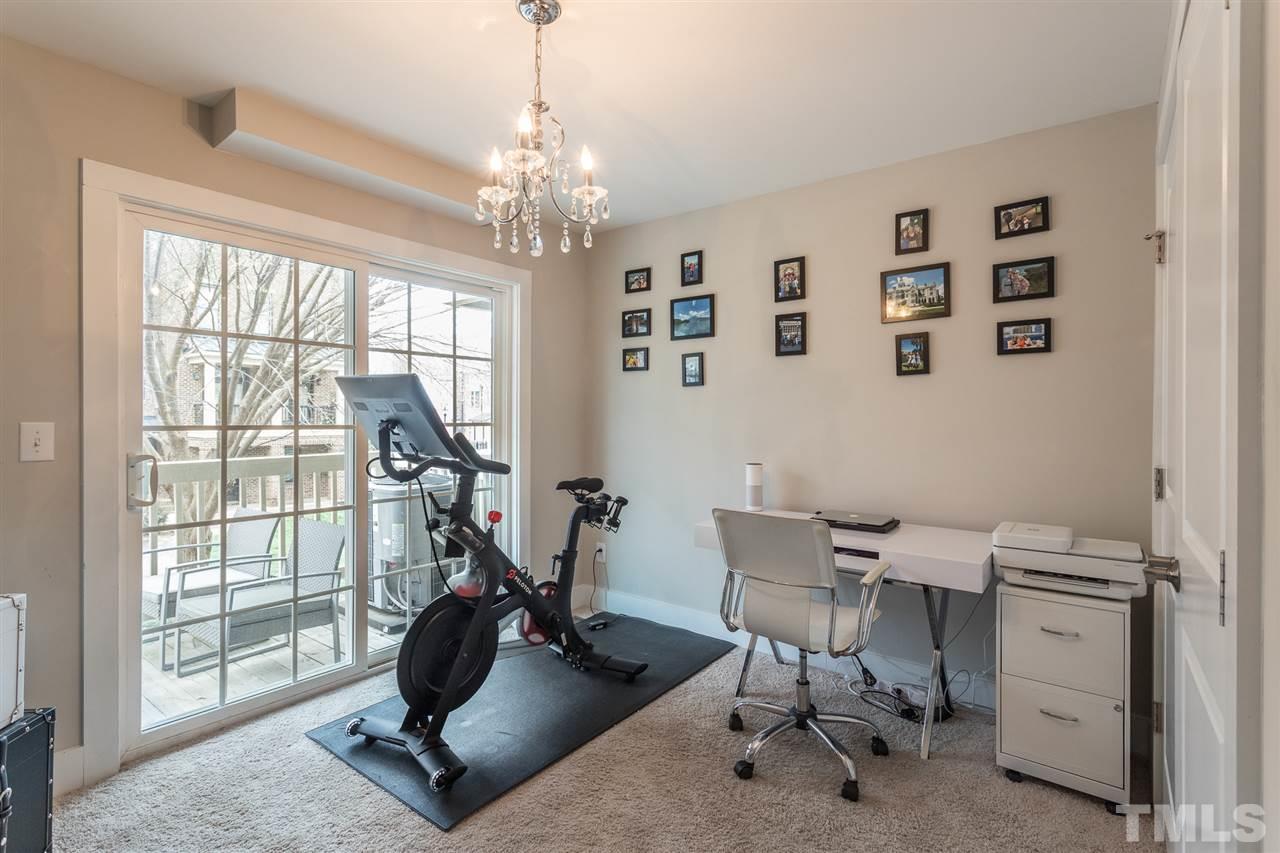 531 North Person Street, Unit 103 Raleigh, NC 27604 - Photo 18 of 21 Whether you prefer an extra bedroom or a home office, you'll enjoy the serenity of the deck overlooking the greenery in the heart of downtown.