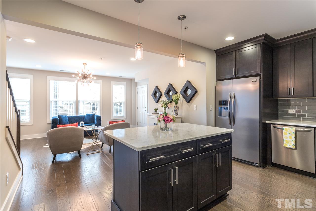 531 North Person Street, Unit 103 Raleigh, NC 27604 - Photo 9 of 21 Island life is the best life. Prep station for wine night? Eat-in kitchen? Storage? How about all of the above!
