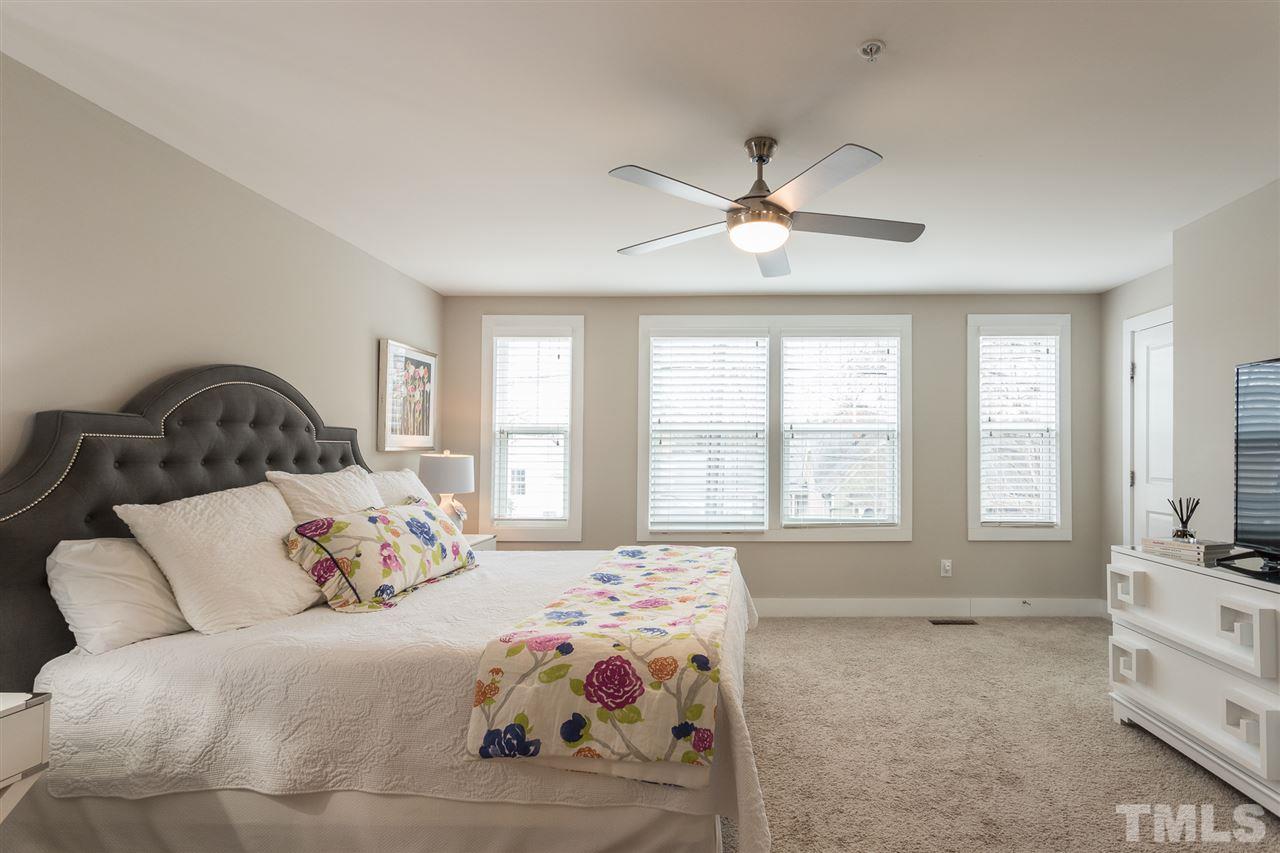 531 North Person Street, Unit 103 Raleigh, NC 27604 - Photo 10 of 21 The serene master bedroom is spacious enough to be luxurious, and comfortable enough to feel like home.