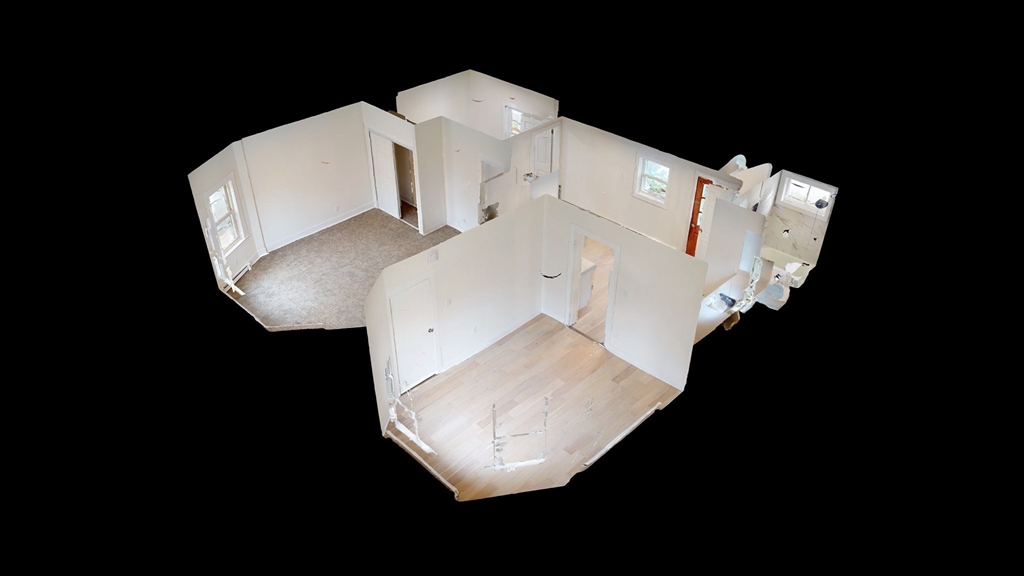 71 Water Street, Unit 1 Quincy, MA 02169 - Photo 10 of 10 a living room with furniture and a couch