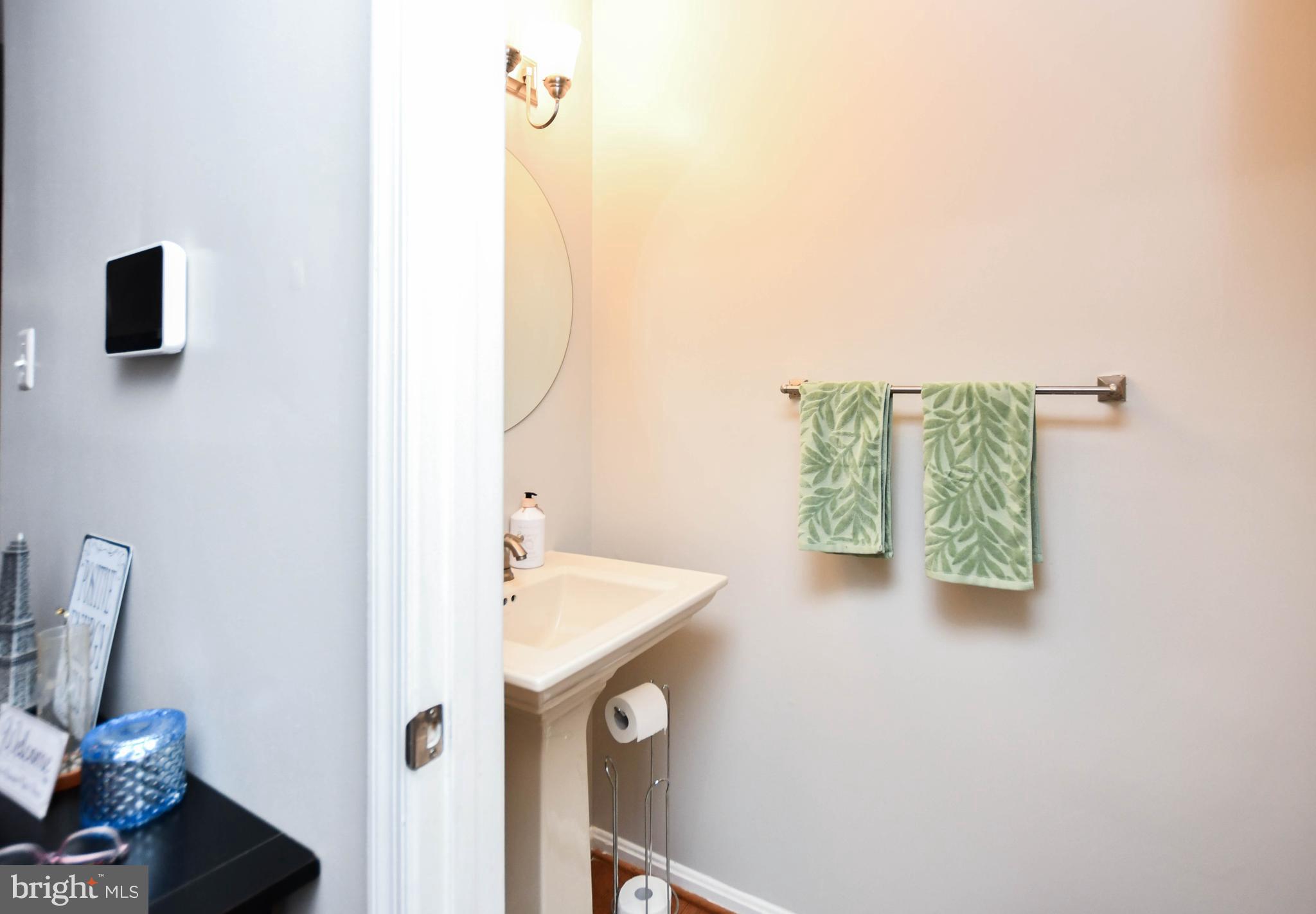 5534 Rockfish Way Clinton, MD 20735 - Photo 21 of 49 a bathroom with a bathtub and a sink