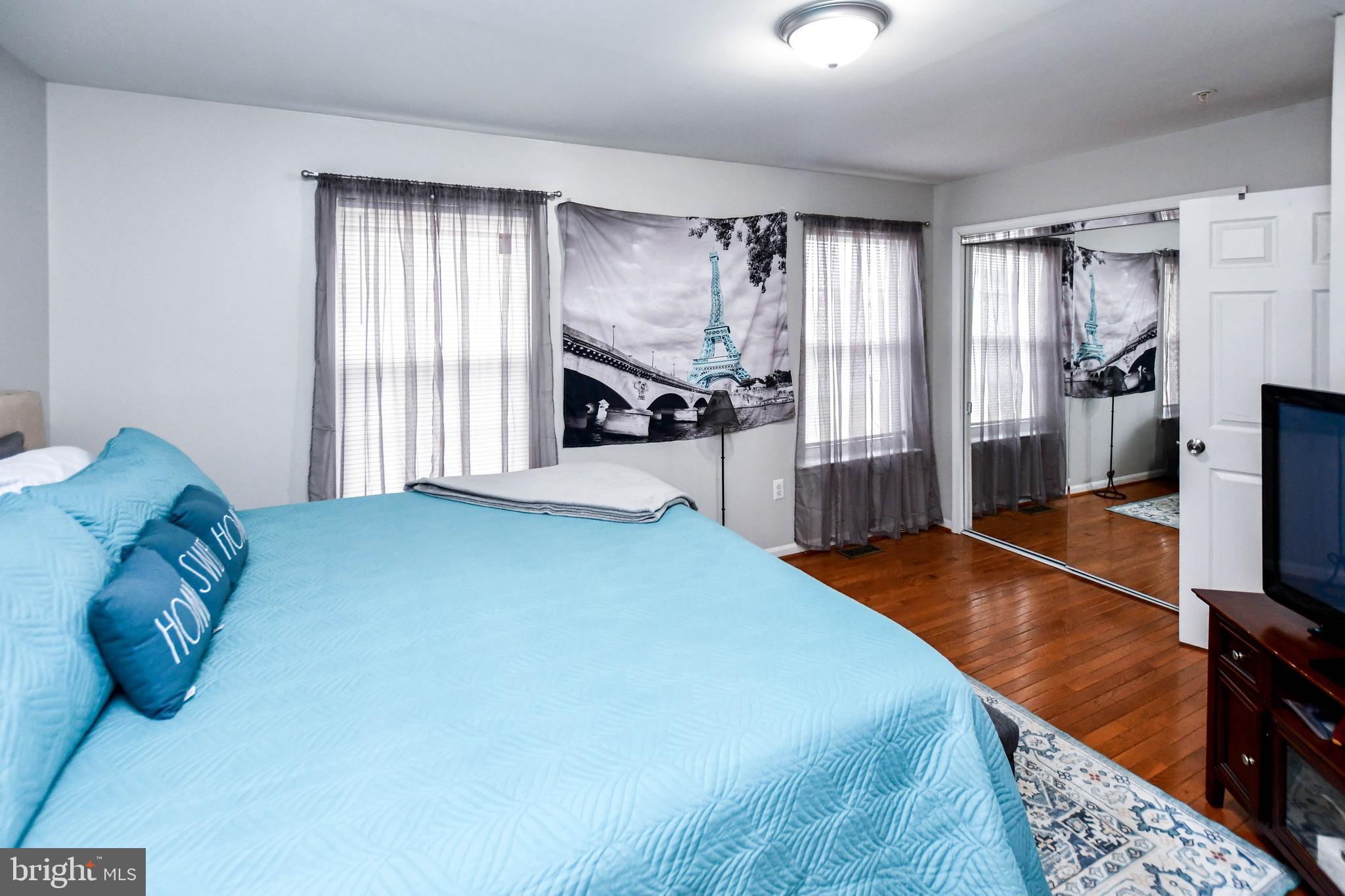 5534 Rockfish Way Clinton, MD 20735 - Photo 31 of 49 a bed room with a bed and a television