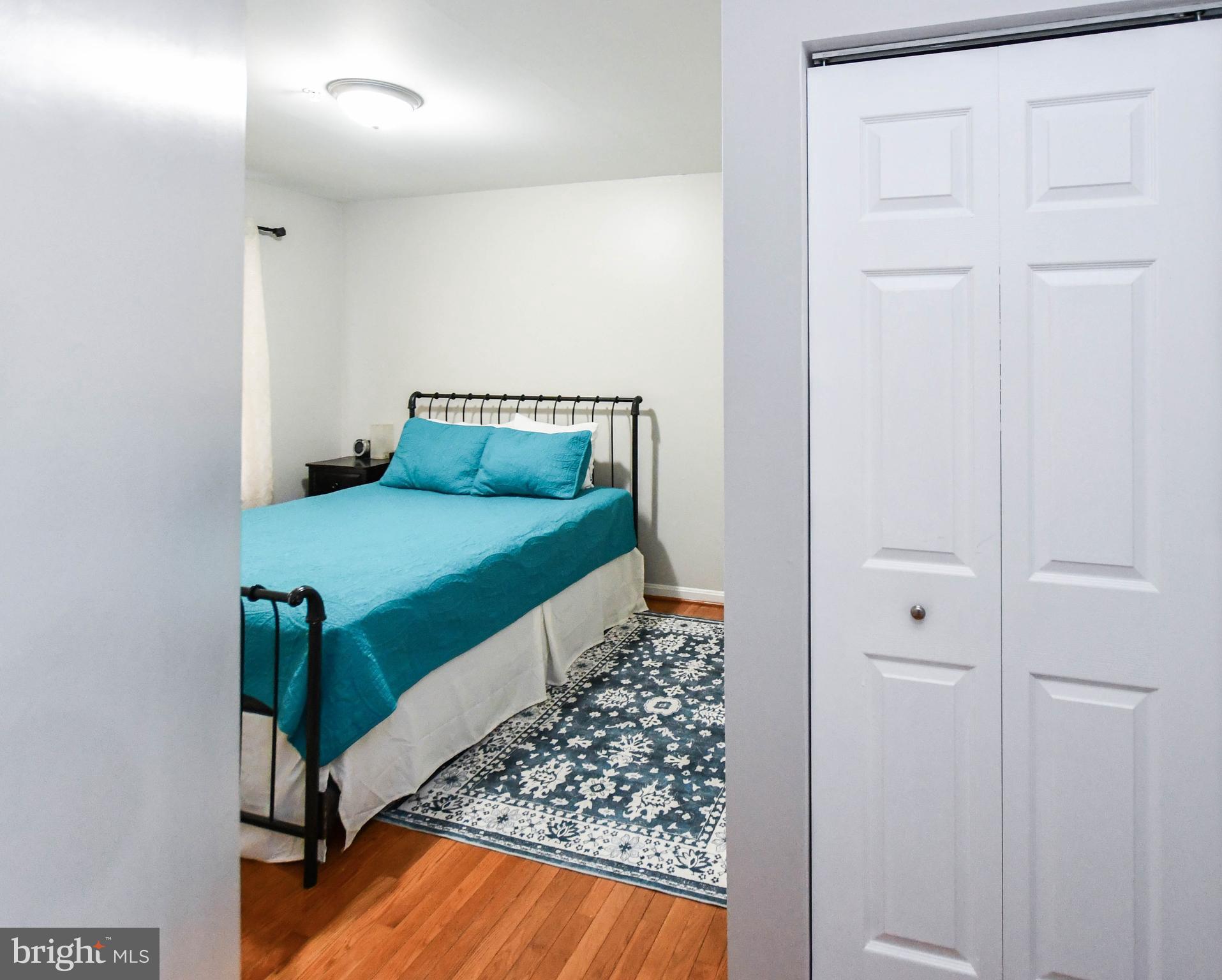 5534 Rockfish Way Clinton, MD 20735 - Photo 34 of 49 a bedroom with a bed and a window