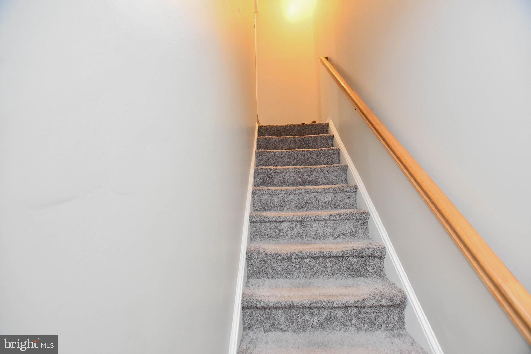 5534 Rockfish Way Clinton, MD 20735 - Photo 44 of 49 a view of staircase with white walls