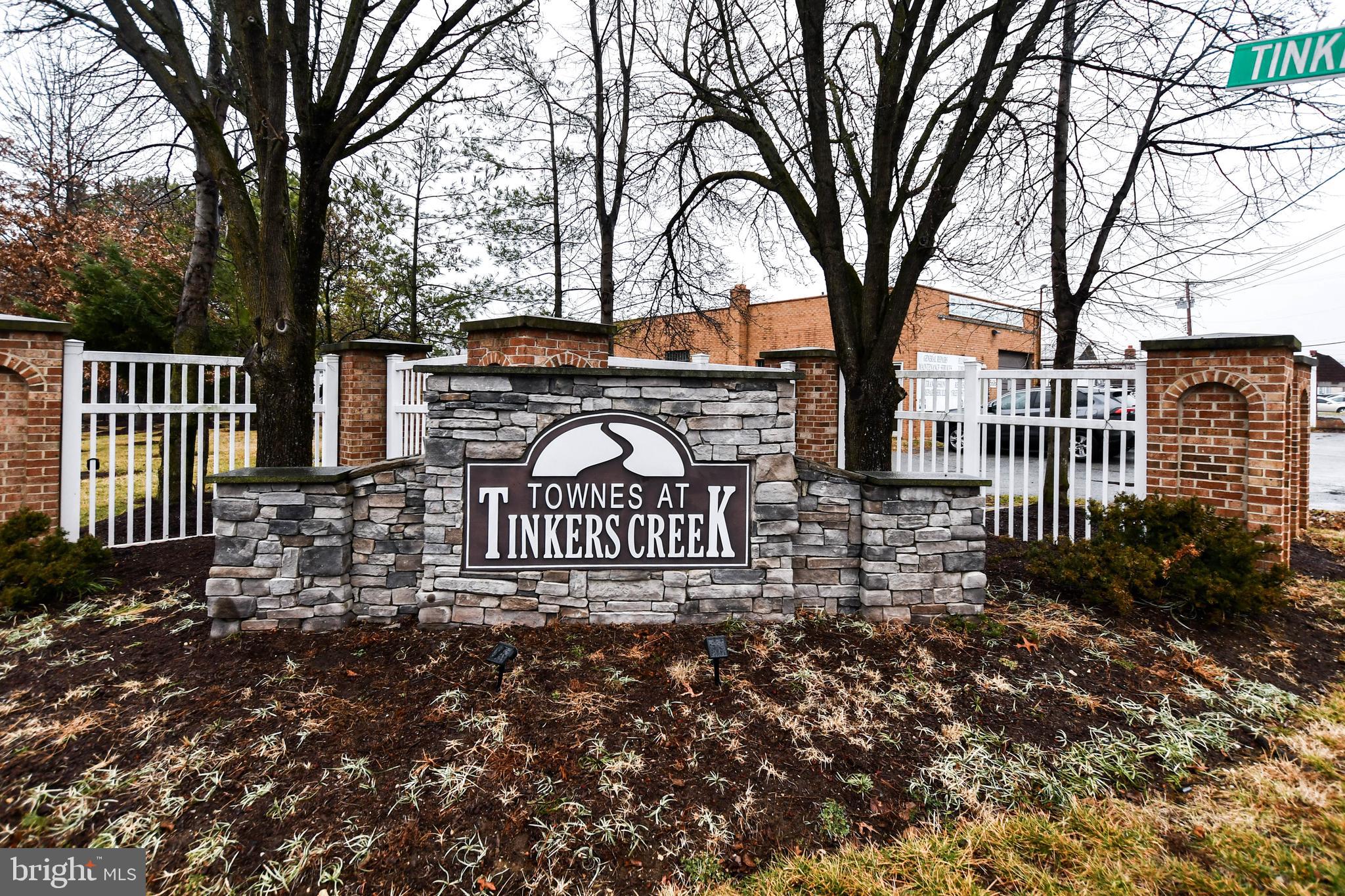 5534 Rockfish Way Clinton, MD 20735 - Photo 48 of 49 a view of street sign under a large tree