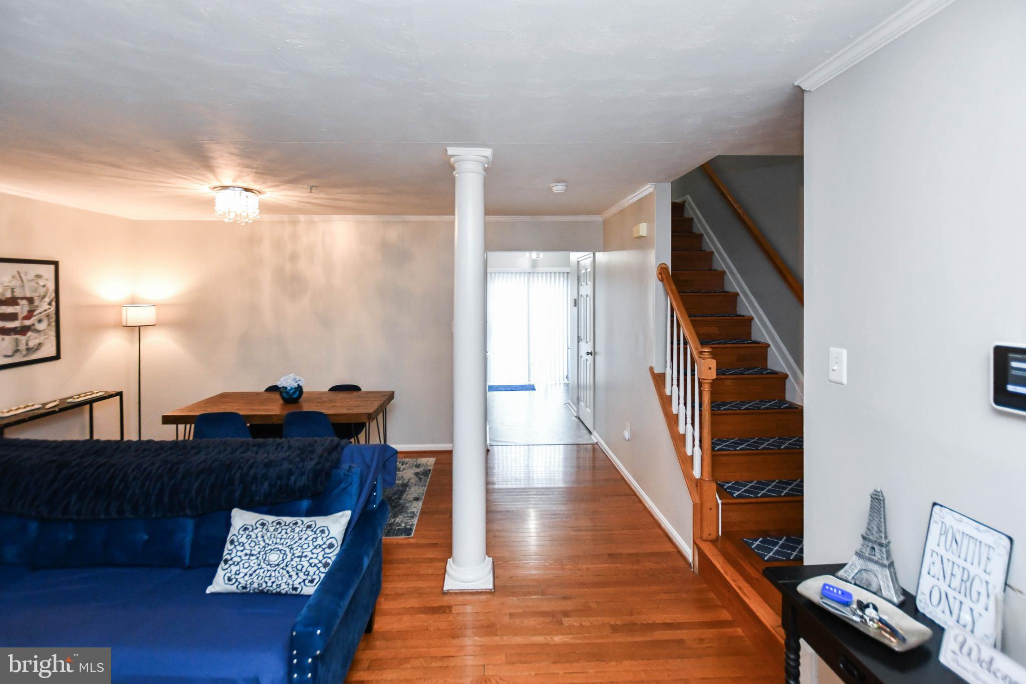 5534 Rockfish Way Clinton, MD 20735 - Photo 5 of 49 a living room with furniture and wooden floor