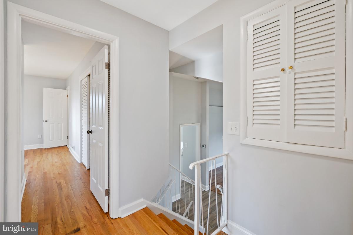 11514 Yates Street Silver Spring, MD 20902 - Photo 14 of 30 a view of front door and wooden floor