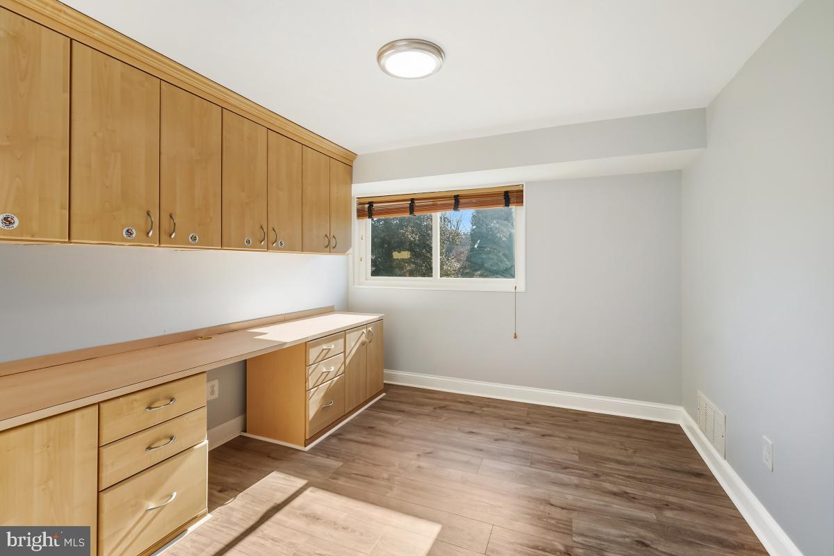 11514 Yates Street Silver Spring, MD 20902 - Photo 23 of 30 a room with cabinets and window