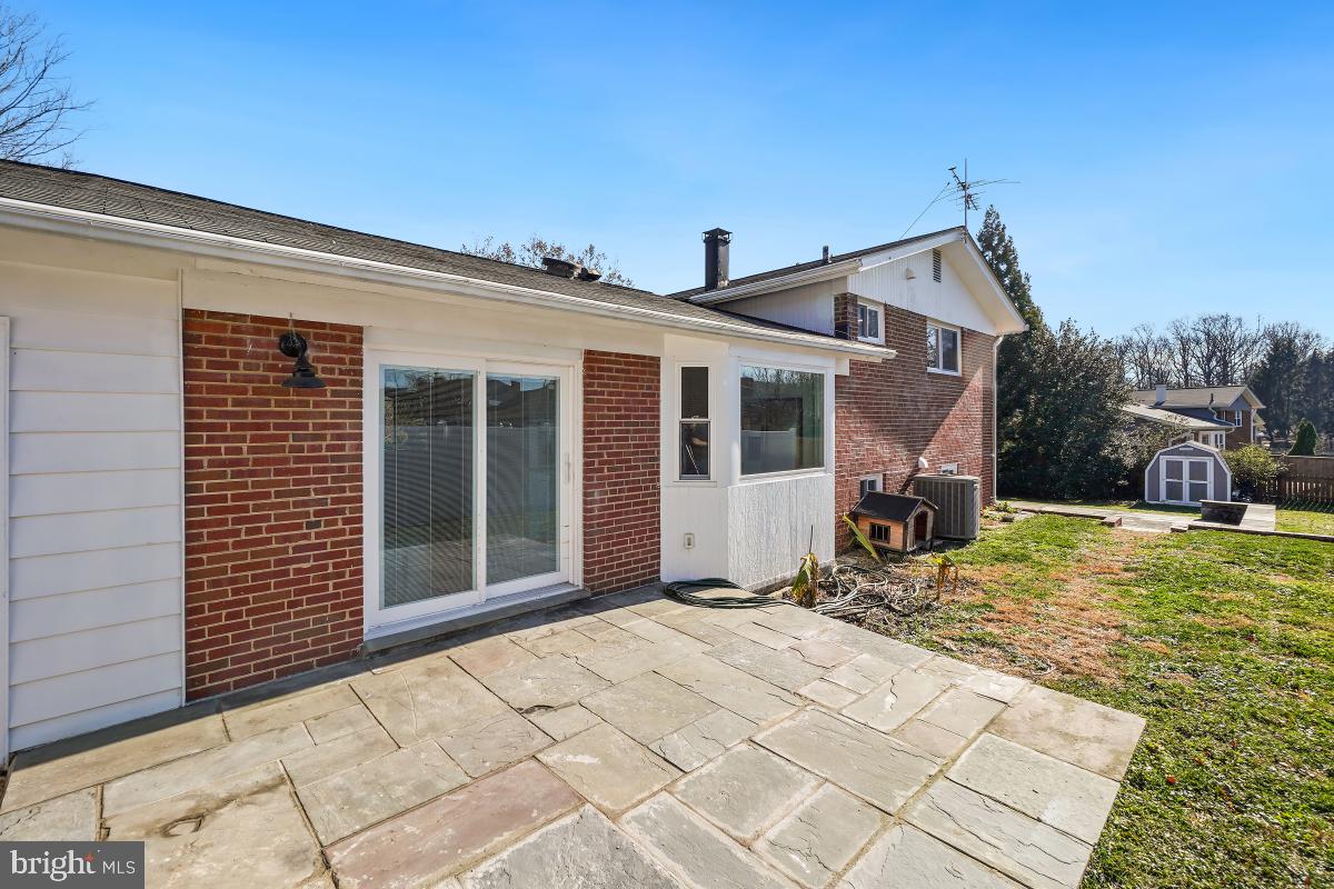 11514 Yates Street Silver Spring, MD 20902 - Photo 26 of 30 a view of a house with a patio