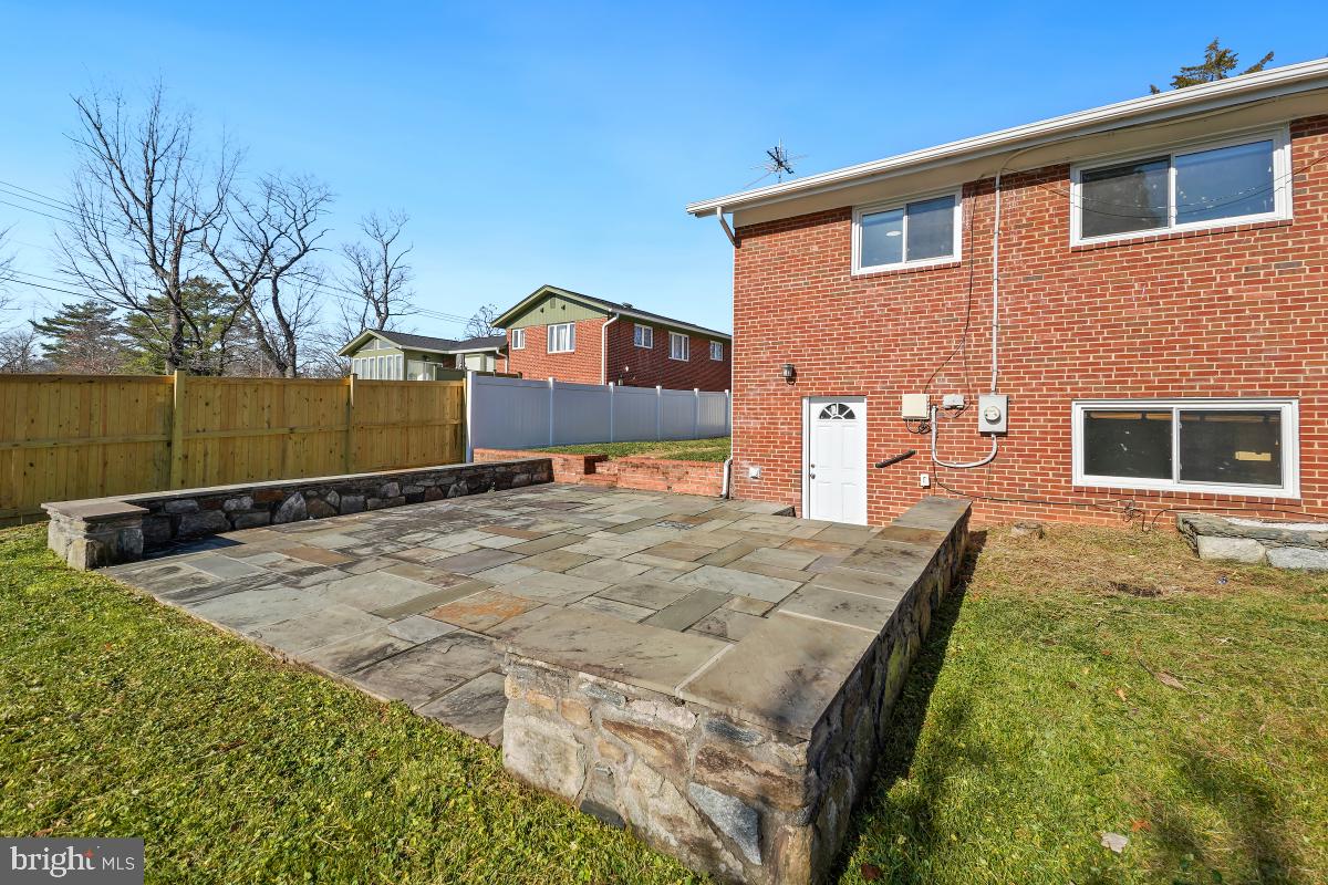 11514 Yates Street Silver Spring, MD 20902 - Photo 28 of 30 a front view of a house with trees