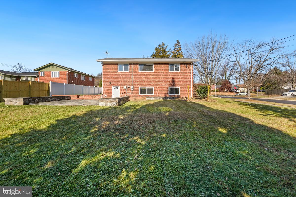11514 Yates Street Silver Spring, MD 20902 - Photo 30 of 30 a view of a house with a yard