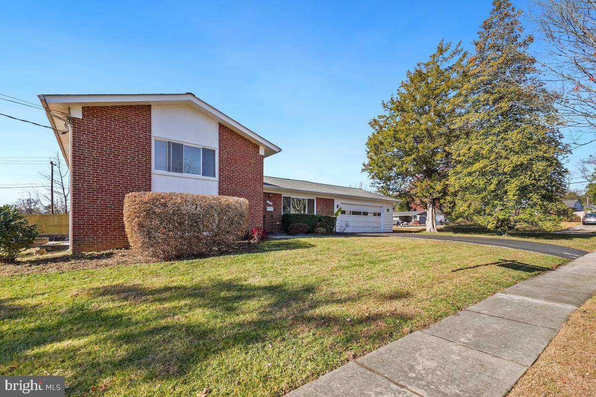 11514 Yates Street Silver Spring, MD 20902 - Photo 3 of 30 a view of house with yard