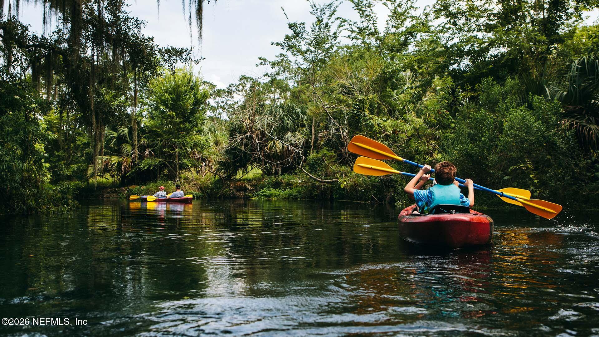 3576 Prancer Point Middleburg, FL 32068 - Photo 8 of 12 a backyard of a house with yard and outdoor seating
