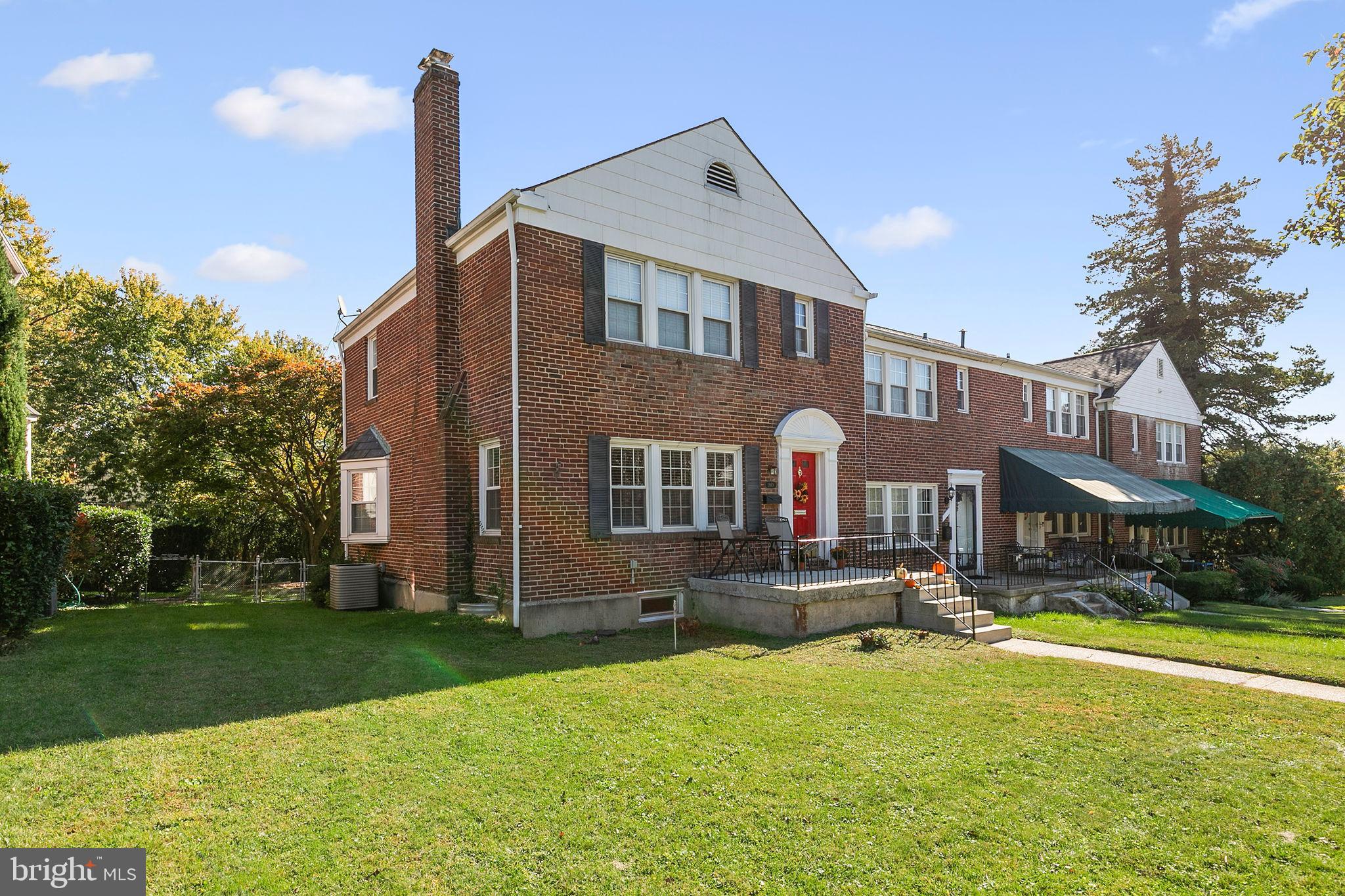 1860 Loch Shiel Road Towson, MD 21286 - Photo 1 of 58 a front view of building with yard and green space