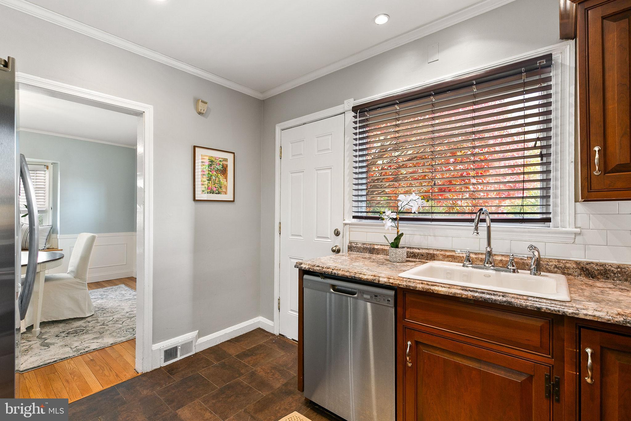 1860 Loch Shiel Road Towson, MD 21286 - Photo 13 of 58 a bathroom with a granite countertop sink and a mirror