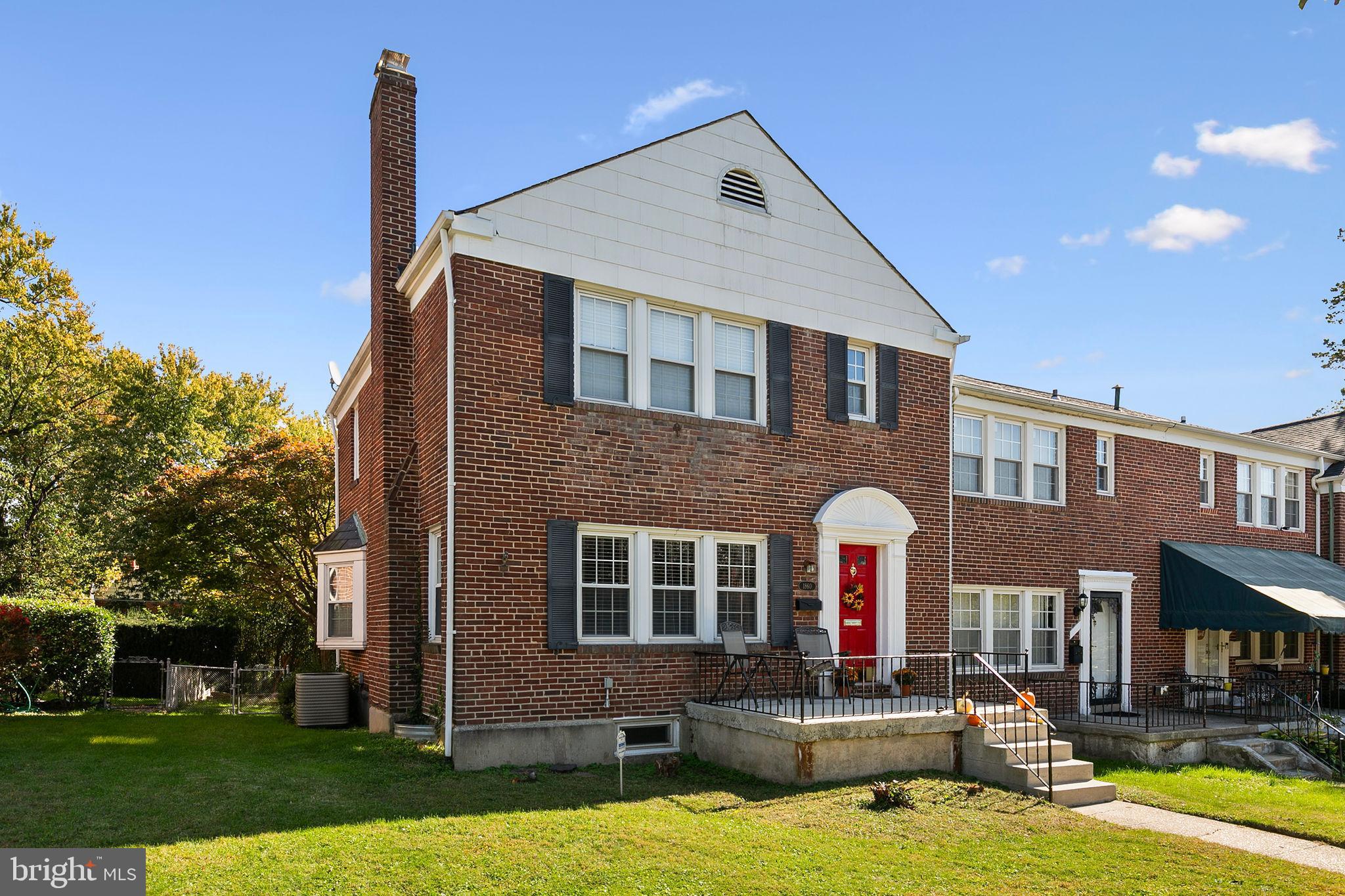 1860 Loch Shiel Road Towson, MD 21286 - Photo 2 of 58 a front view of a house with swimming pool and yard