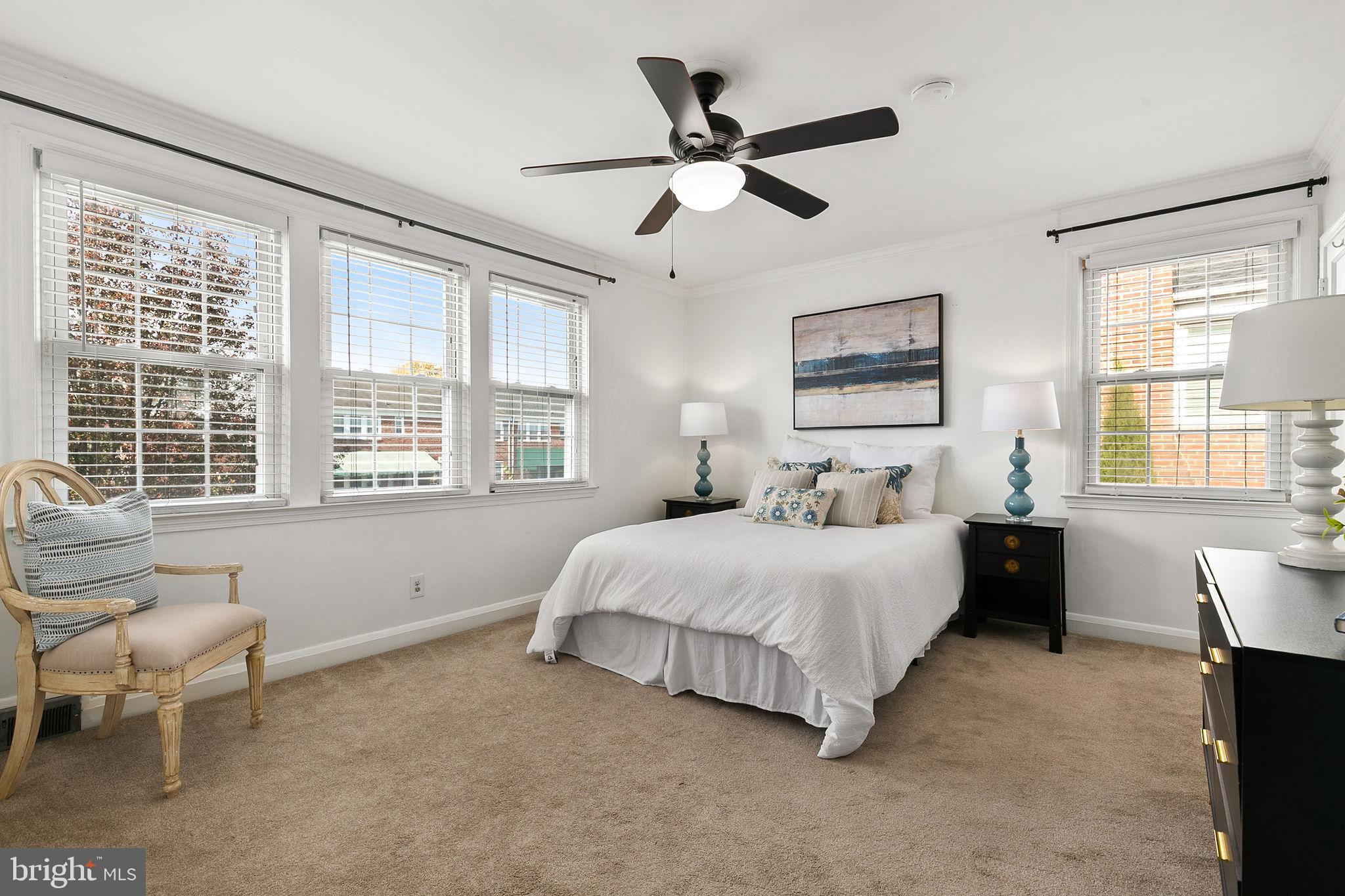 1860 Loch Shiel Road Towson, MD 21286 - Photo 35 of 58 a spacious bedroom with a large bed and a window