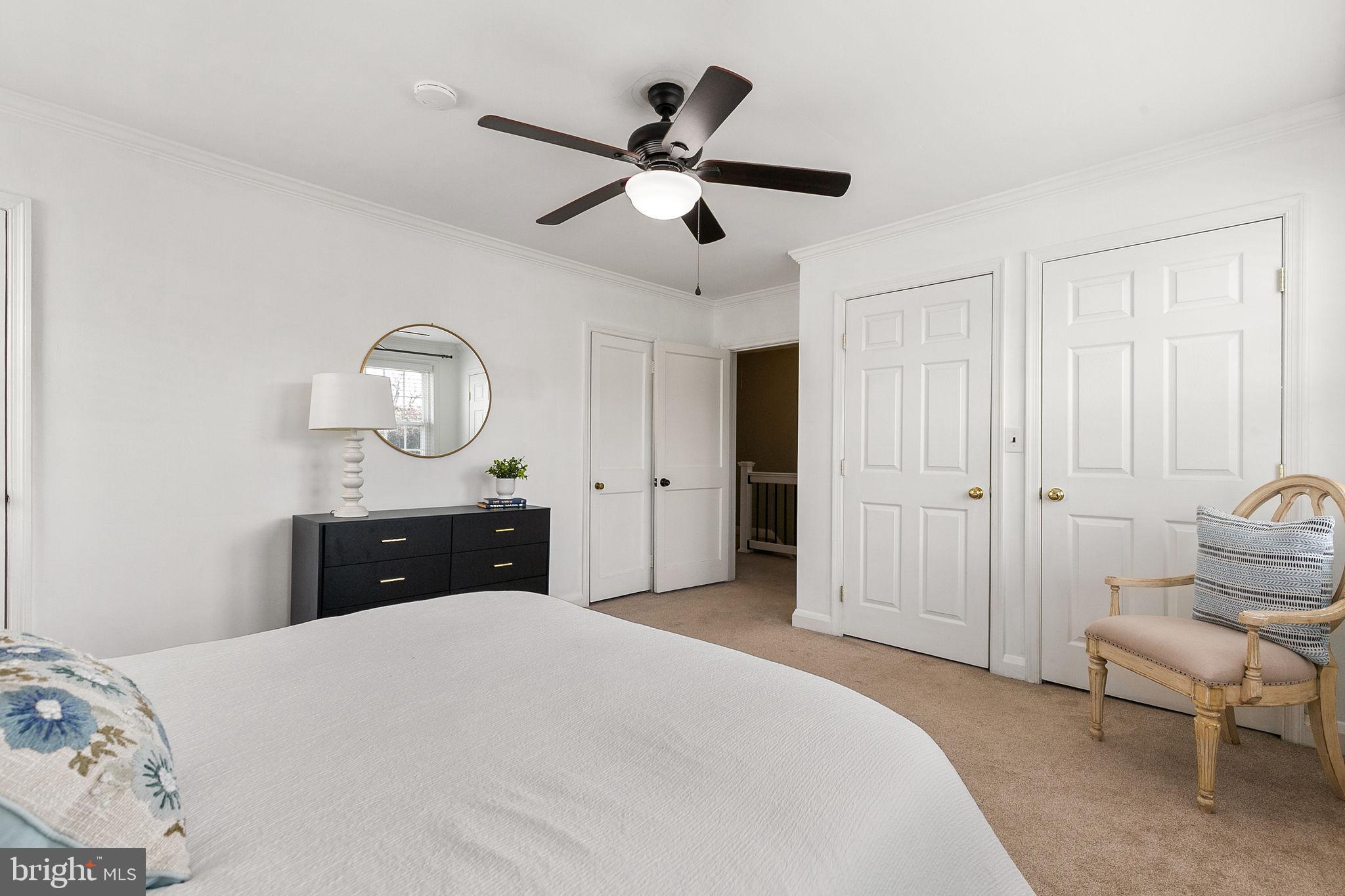 1860 Loch Shiel Road Towson, MD 21286 - Photo 36 of 58 a bedroom with a bed and wooden floor