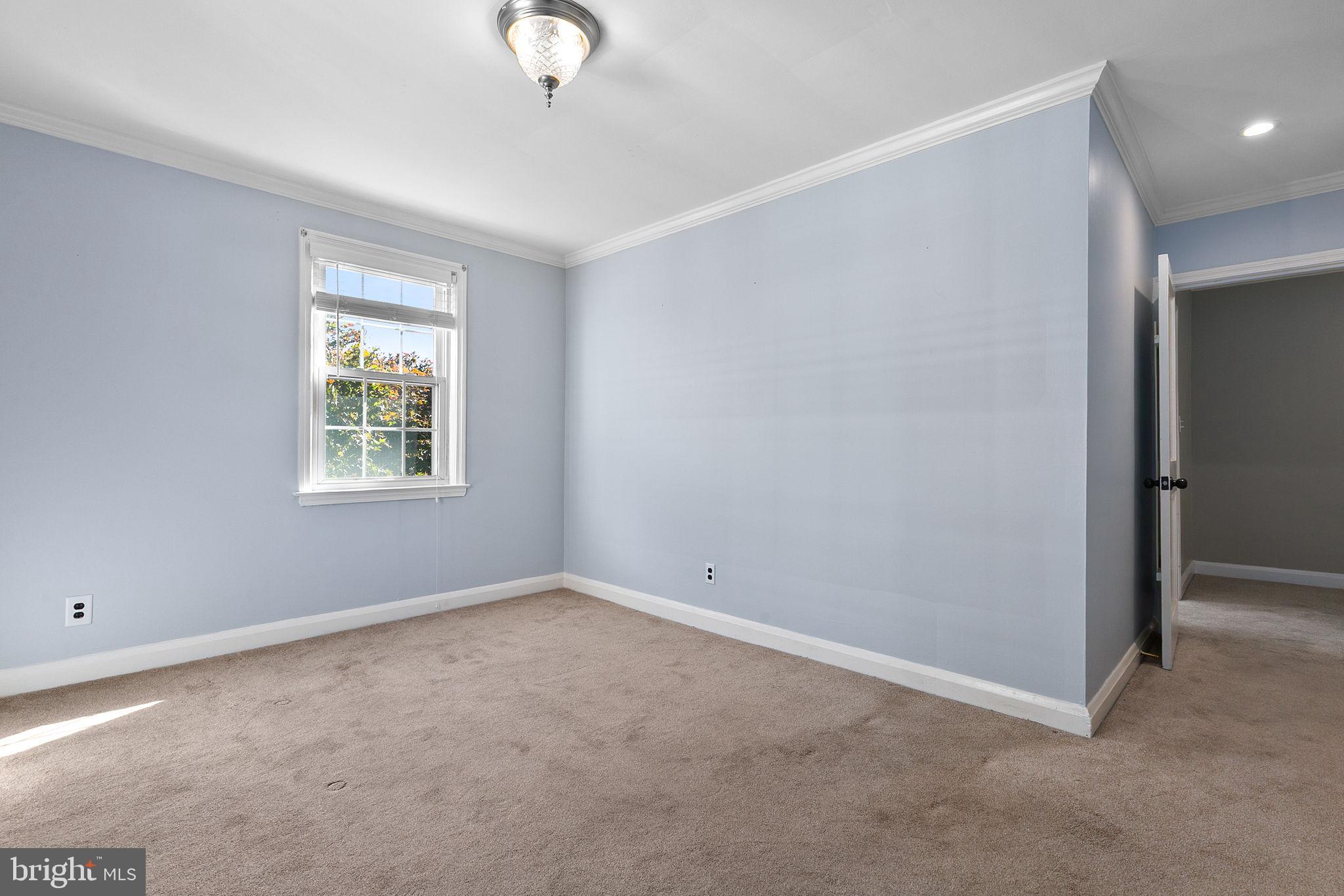 1860 Loch Shiel Road Towson, MD 21286 - Photo 39 of 58 an empty room with windows and closet