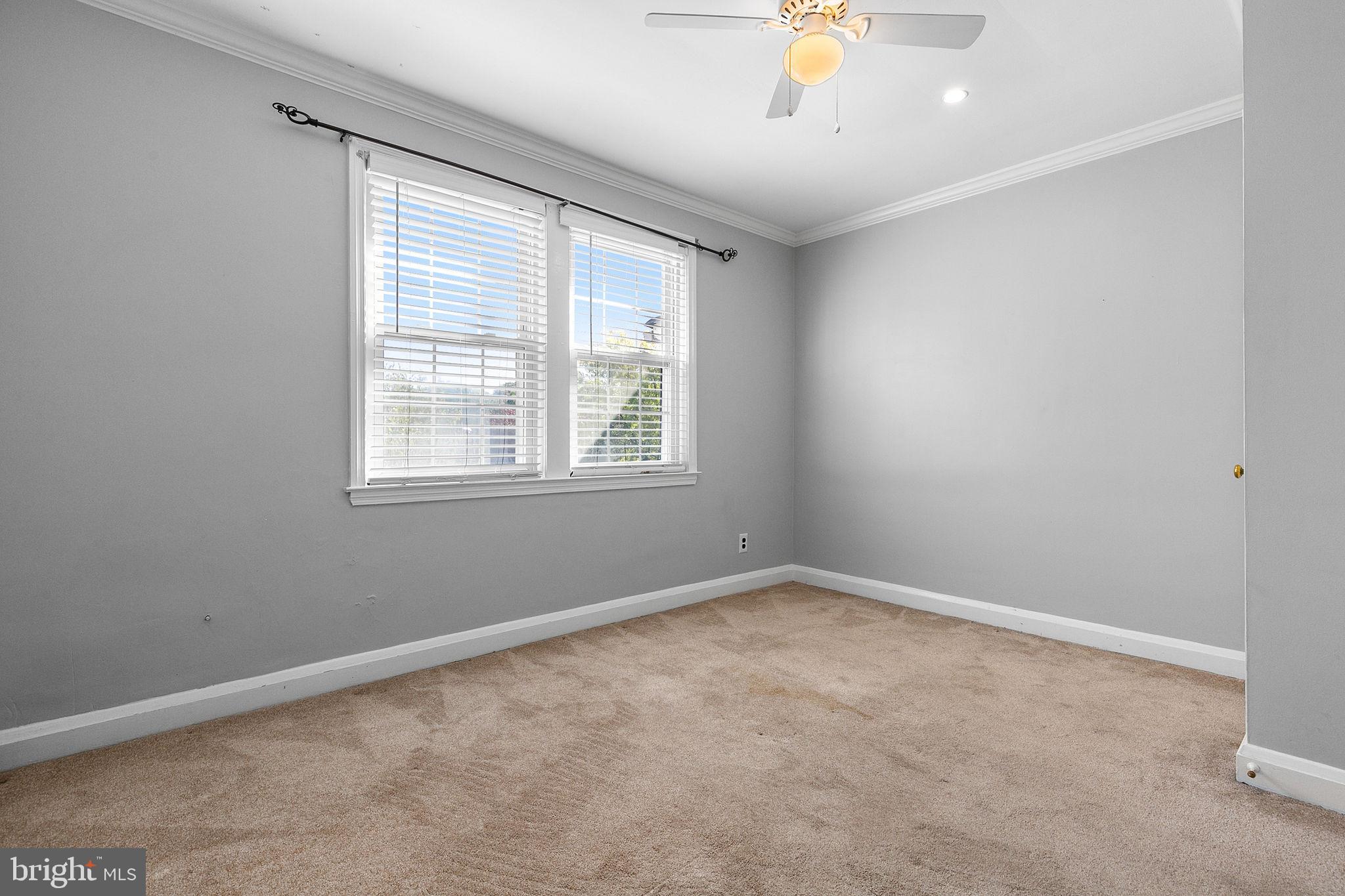 1860 Loch Shiel Road Towson, MD 21286 - Photo 41 of 58 an empty room with a window