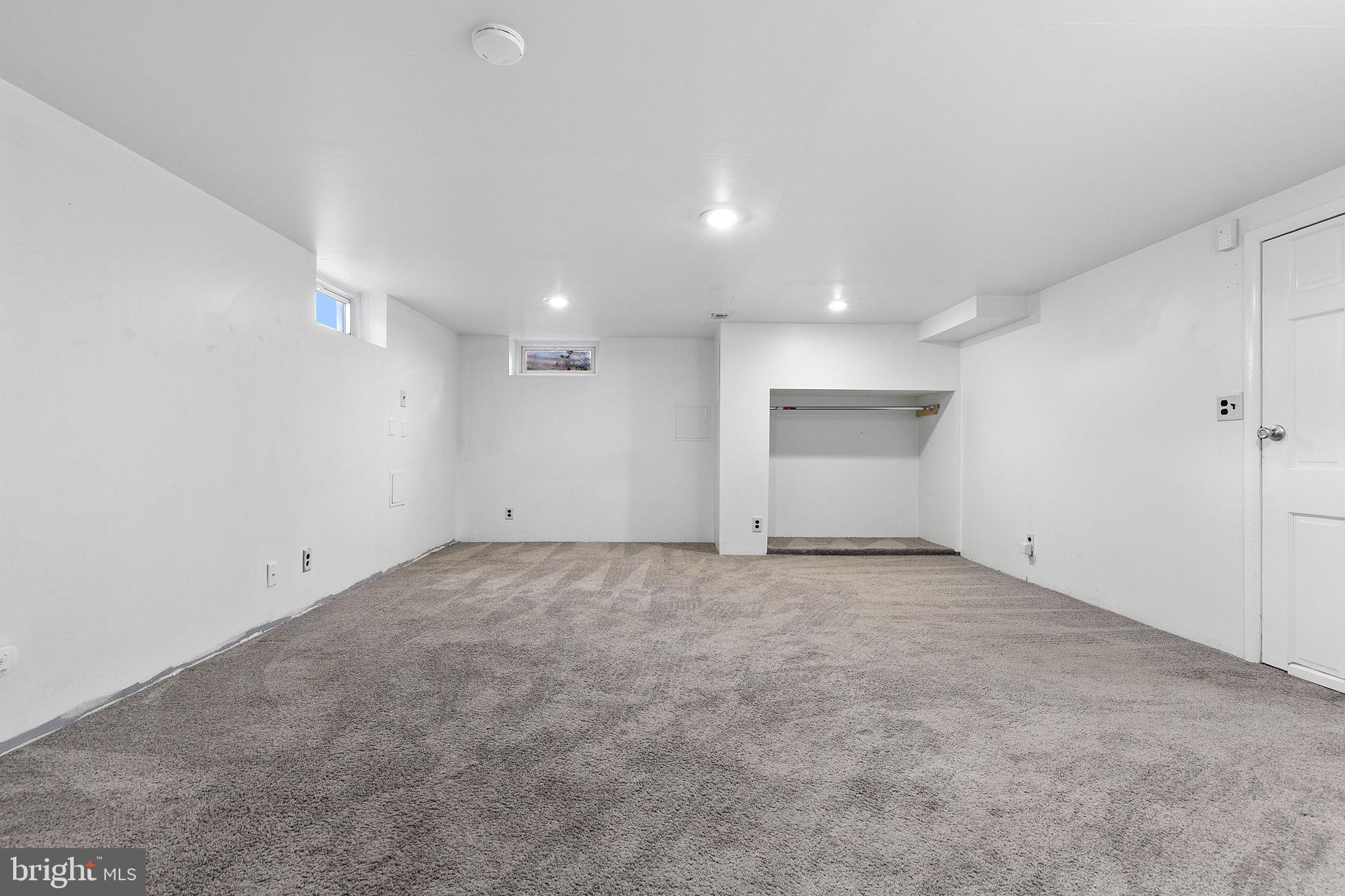 1860 Loch Shiel Road Towson, MD 21286 - Photo 46 of 58 an empty room with a empty space and windows