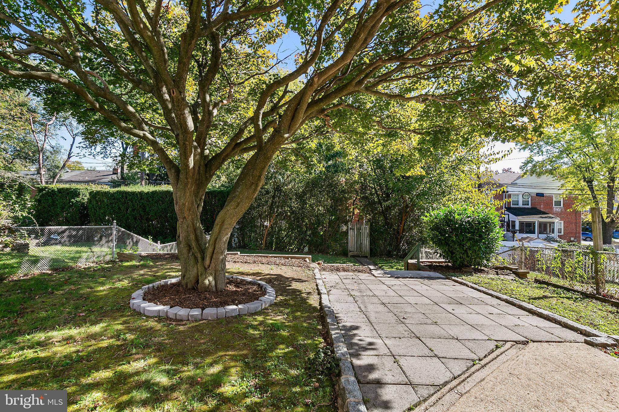 1860 Loch Shiel Road Towson, MD 21286 - Photo 55 of 58 a front view of a house with a yard
