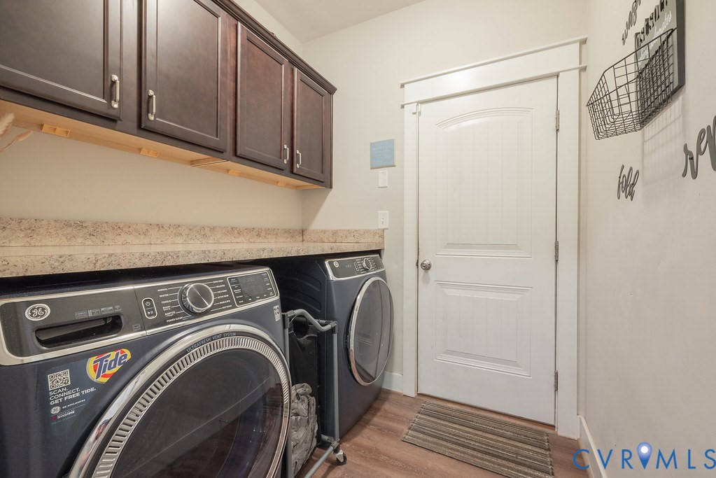6446 Chestnut Church Road Mechanicsville, VA 23116 - Photo 25 of 49 Laundry area featuring wood-finish flooring, dark