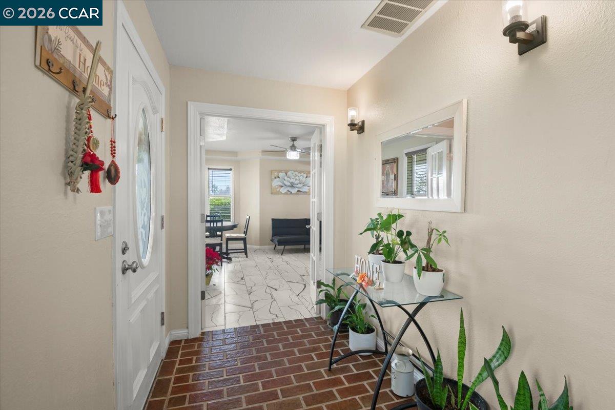 24685 Fuhrman Road Acampo, CA 95220 - Photo 14 of 58 a view of entryway with wooden floor