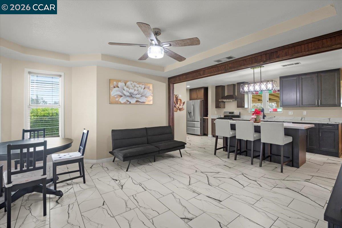 24685 Fuhrman Road Acampo, CA 95220 - Photo 15 of 58 a view of a dining room with furniture