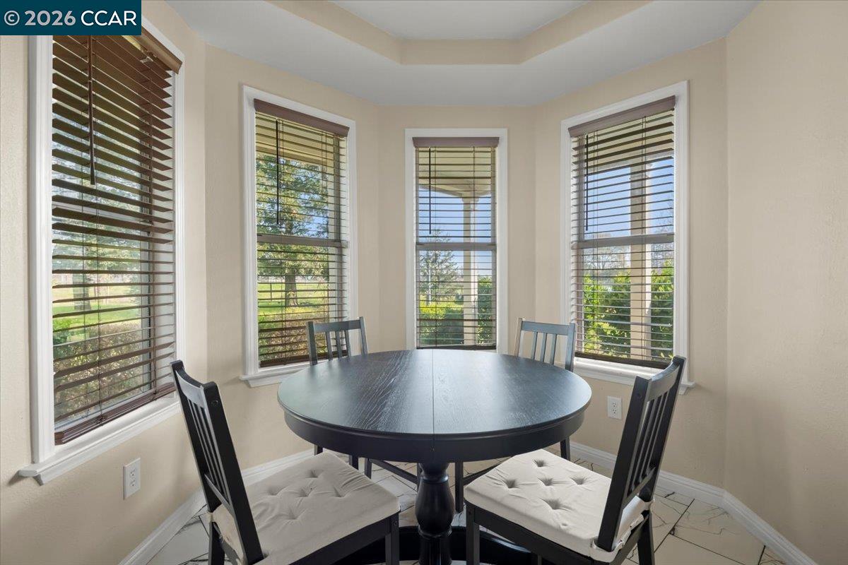 24685 Fuhrman Road Acampo, CA 95220 - Photo 18 of 58 a view of a dining room with furniture and window