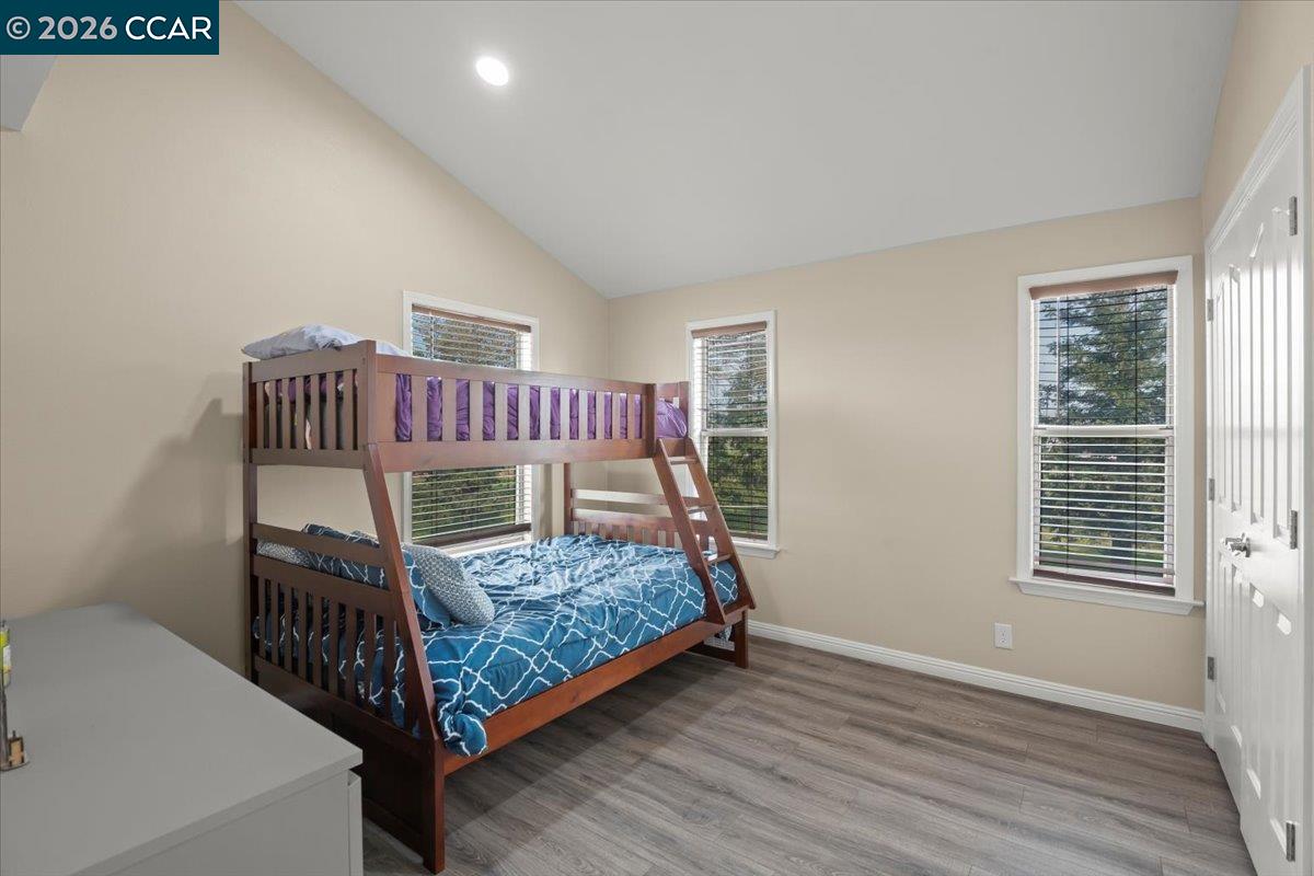 24685 Fuhrman Road Acampo, CA 95220 - Photo 30 of 58 a bedroom with a bed and a window