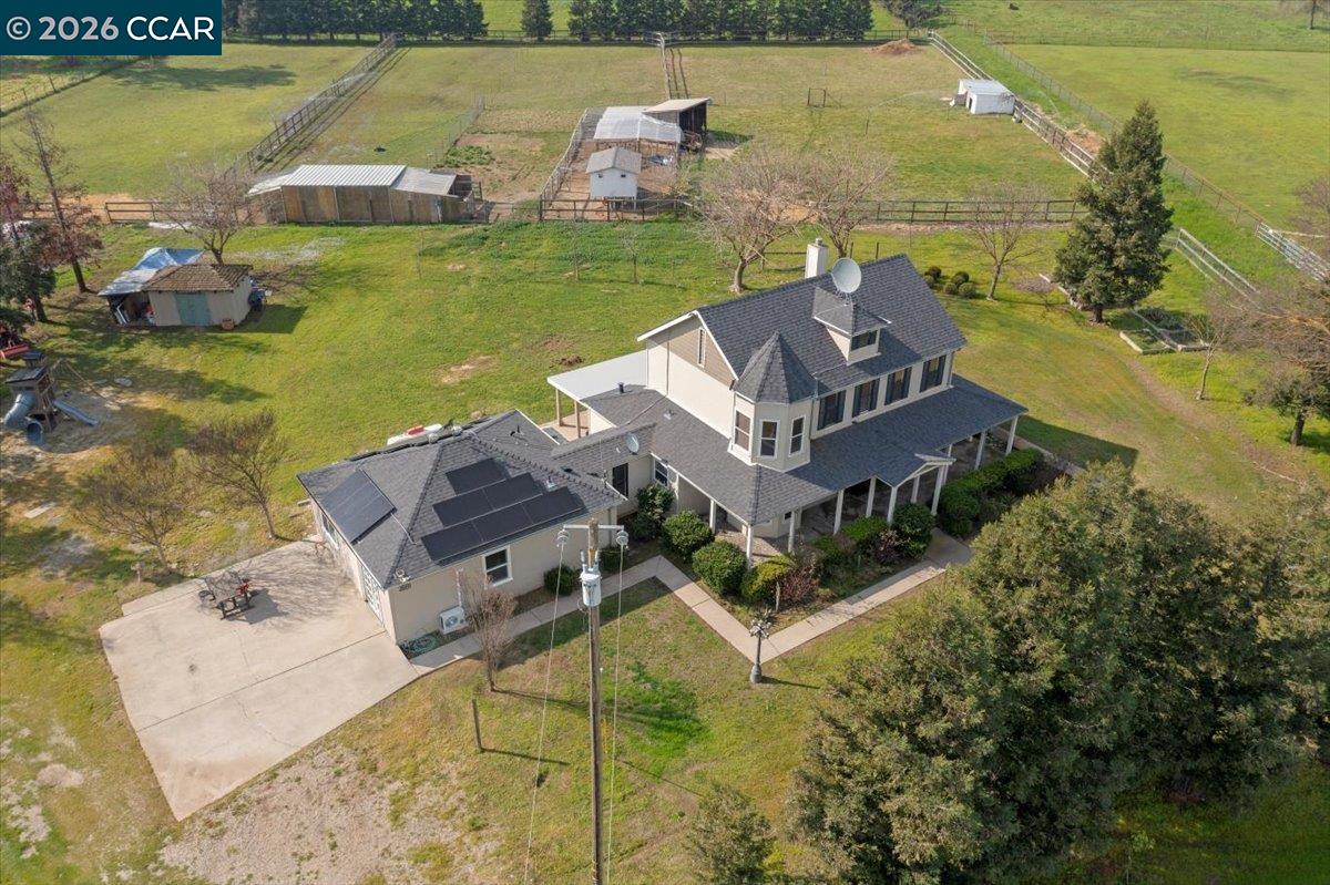 24685 Fuhrman Road Acampo, CA 95220 - Photo 4 of 58 a view of a house with a ocean view