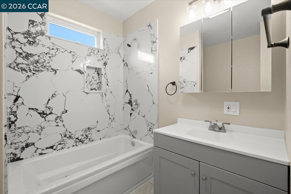 24685 Fuhrman Road Acampo, CA 95220 - Photo 41 of 58 a bathroom with a sink and a bathtub