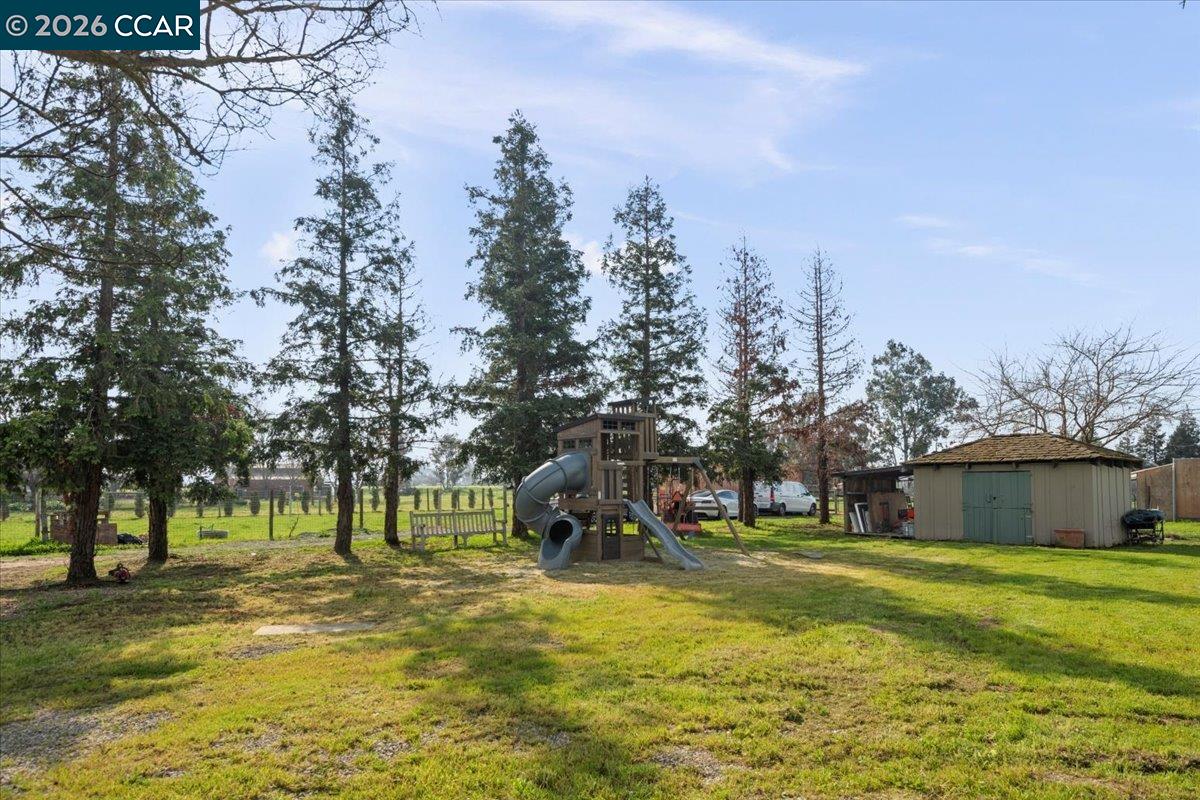 24685 Fuhrman Road Acampo, CA 95220 - Photo 47 of 58 a view of a house with a yard