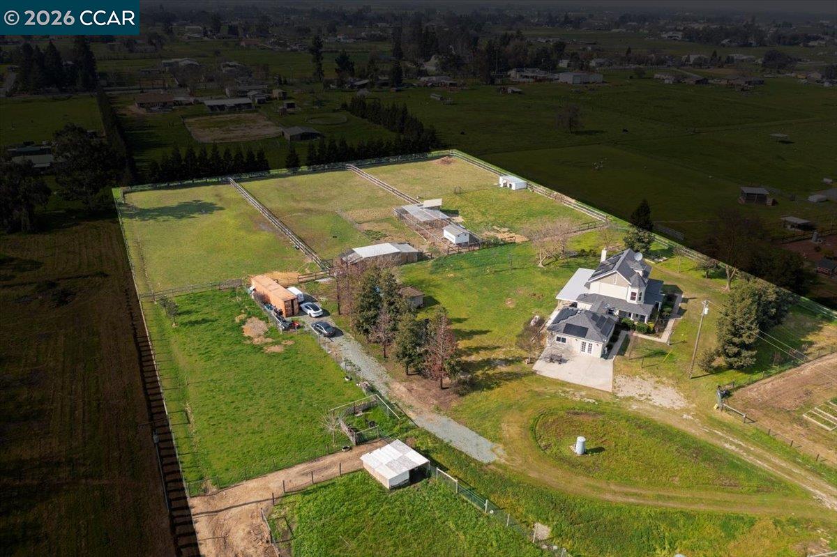 24685 Fuhrman Road Acampo, CA 95220 - Photo 50 of 58 an aerial view of a house with a yard