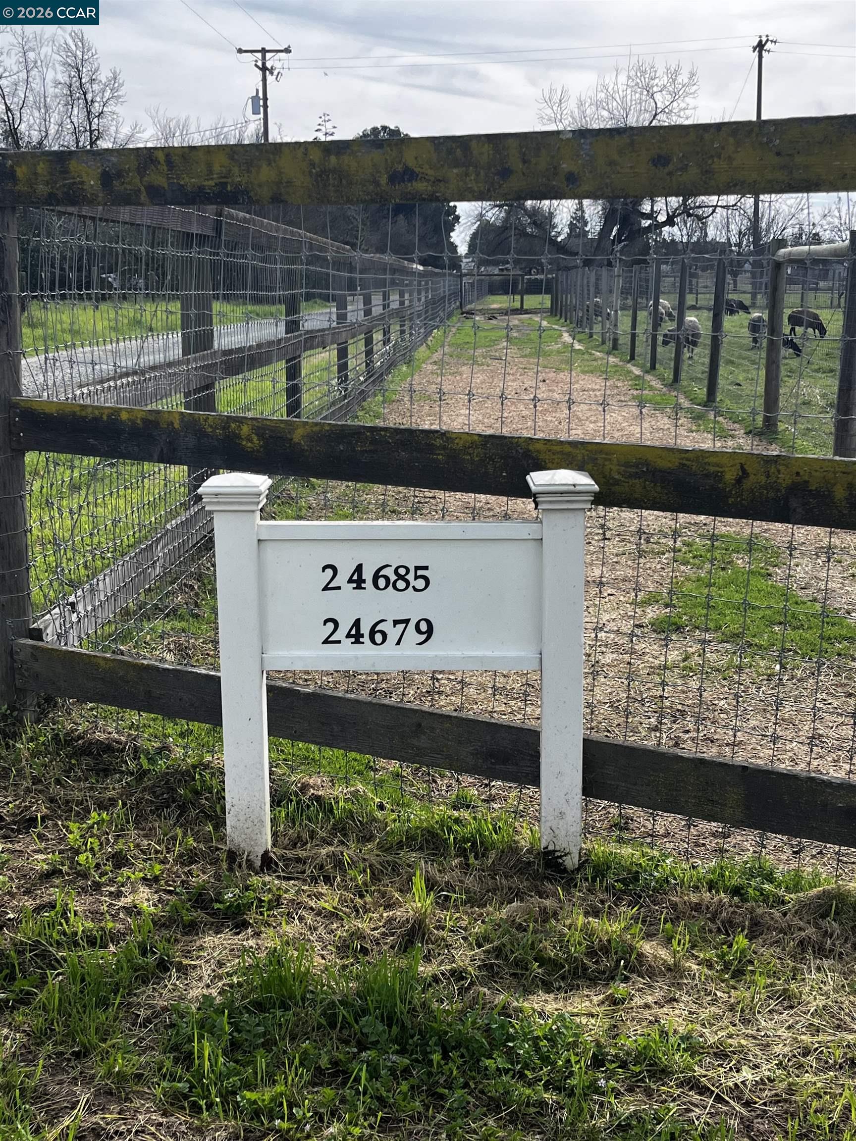 24685 Fuhrman Road Acampo, CA 95220 - Photo 5 of 58 a view of a street sign under a bridge