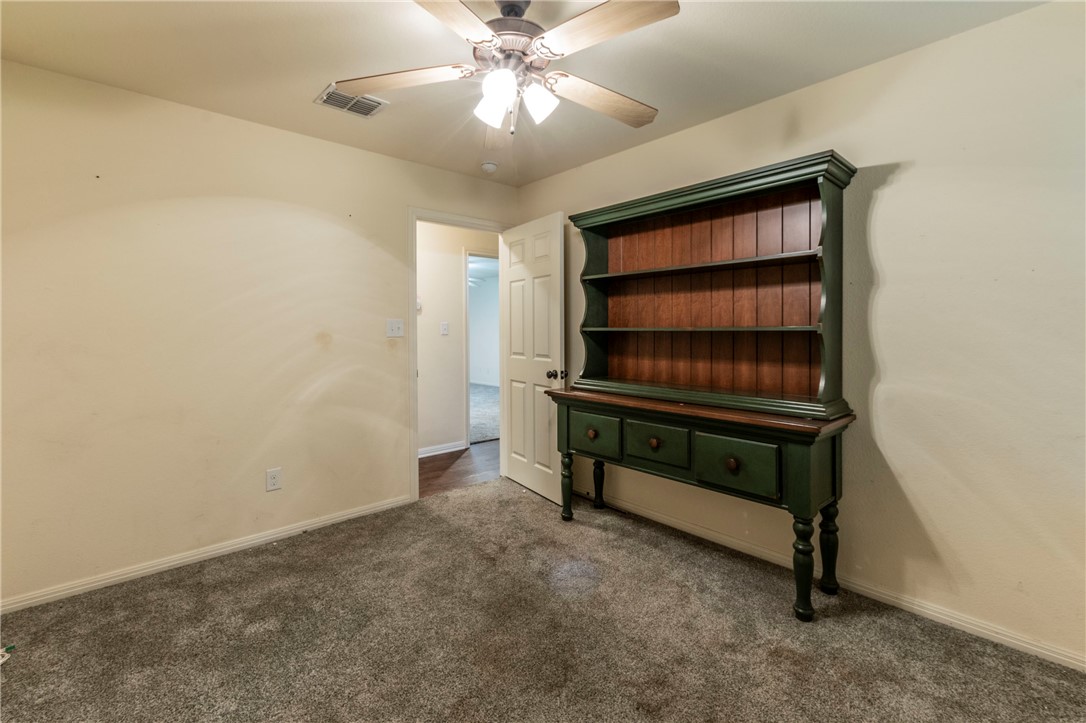 1203 Ave B Waco, TX 76705 - Photo 23 of 32 a view of workspace with furniture and window